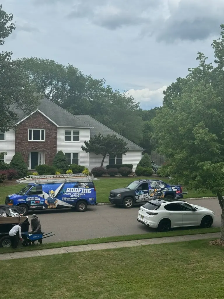 DNC Construction LLC roofing crew on a job site in New Jersey