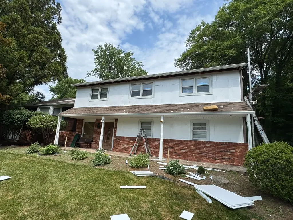 Seamless gutter installed along a roofline in New Jersey