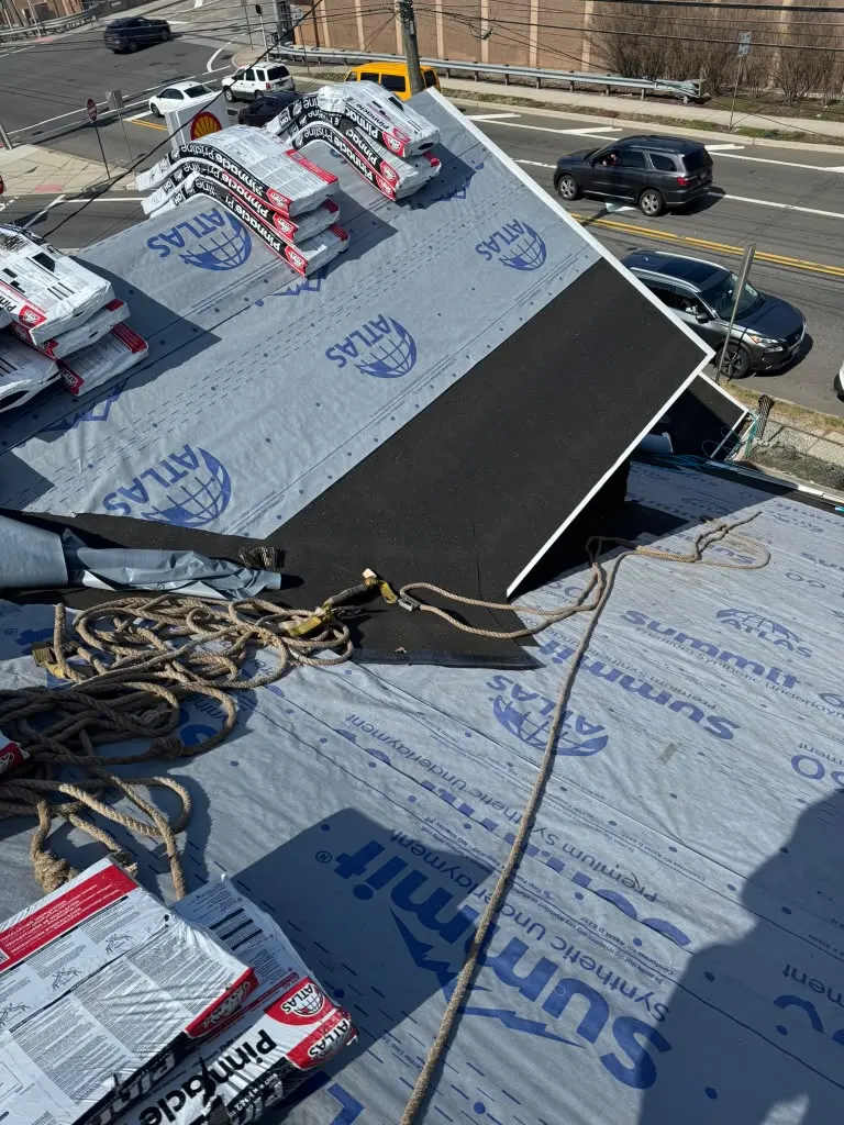 Sealant and fastener detail on a metal roof in New Jersey