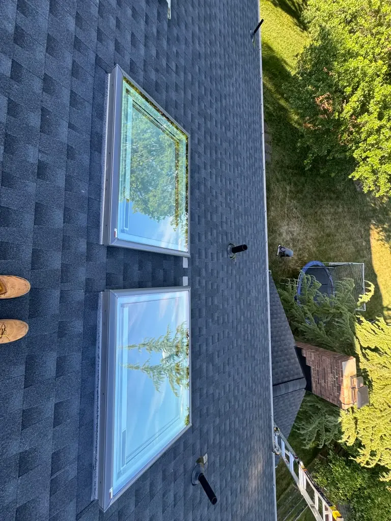 Roof maintenance work on a residential roof in New Jersey